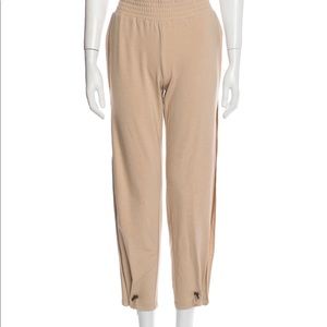 Alice and Olivia skinny pants with leg side openings. Size XS.
